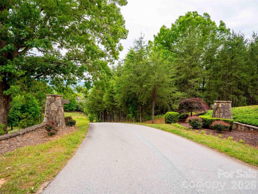 Beautiful cul-de-sac lot with golf course and long range mountain views in the "Reserve" section of Bright's Creek. Bright's Creek is a beautiful development with amazing views, paved roads, fiber optic, water, sewer, & natural gas. Community offers 24 hour staffed greeters cottage and beautiful walking trails including a waterfall trail. Club is separate from the development. Membership available to Brights Creek Club that offers golf, future amenities (fall 2021) to include amenities clubhouse, swimming pool, pickle ball, and tennis.
