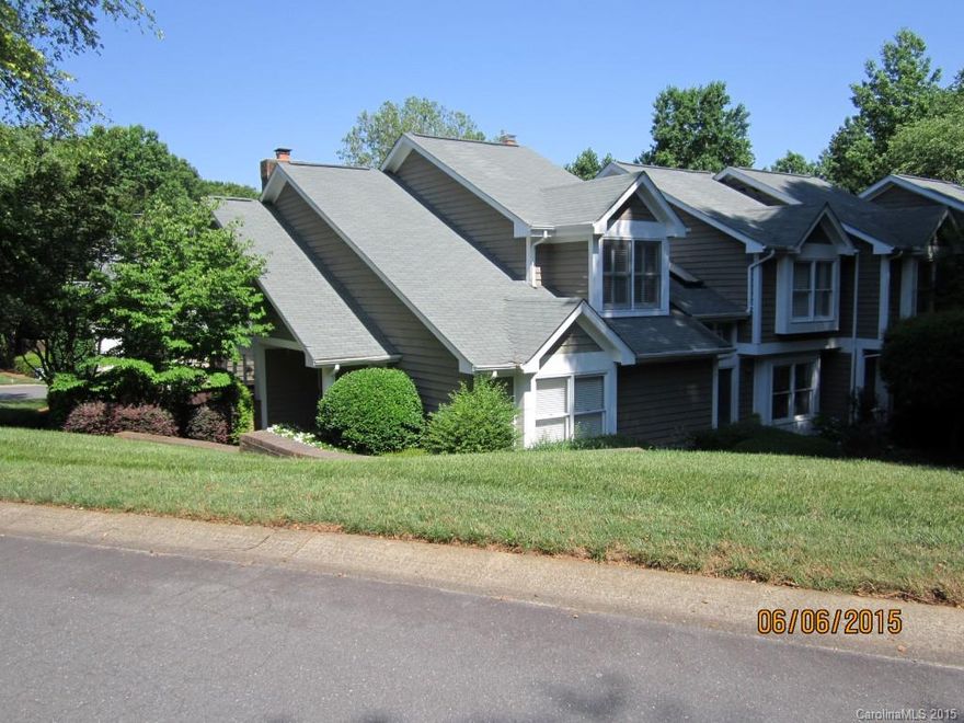 Highly desirable updated end unit in great Quail Hollow location. Home features a large master on the main with custom built dual vanity in the master bath, spacious two story great room with fireplace, hardwoods, granite countertops, plantation shutters, 2 car garage, 2 patios, and 1 porch. Home has brand new HVAC unit and recently replaced carpet. Units location provides loads of natural light and is close to tennis courts, pool, clubhouse, and the fitness center. A must see!