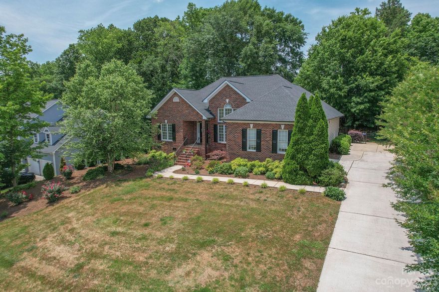 This stunning 1970 square foot, 3 bedroom, 2 bathroom Brick Belmont Ranch in the coveted Timberlake Subdivision 
boasts many desirable features and custom craftsmanship. The open floor plan provides a spacious and welcoming environment. The heavy moldings and tall ceilings add an elegant touch to the space. The cherry finished cabinets in the kitchen provide a beautiful and timeless look. The trey ceilings in the primary bedroom add architectural interest and a sense of luxury. The walk-in tiled shower in the primary bathroom offers both functionality and style. The dual walk-in closets provide ample storage space. The rear deck and screened patio offer options for outdoor relaxation and entertainment. The side load garage is a convenient feature. Beautiful Hardwood flooring and tile throughout, new roof 2018, new HVAC and metal duct 2019, new water heater and LG fridge 2022.

Golf cart ride distance to Historic Downtown Belmont, don't miss this amazing Belmont opportunity.