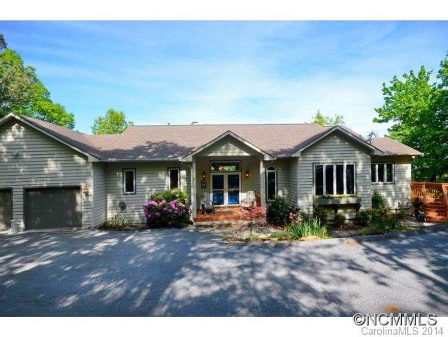 Enjoy mountain views from this contemporary home perched atop the High Vista golf course community. Grand foyer/entry welcomes you to spacious rooms for entertaining or family gatherings, hardwood floors, high ceilings, pond and waterfall feature, large formal dining room, eat-in kitchen with 5-burner gas cooktop, wood burning fireplace plus ceramic stove in den/study. Lower lvl features bedrooms, play room and amazing master bath w/views!