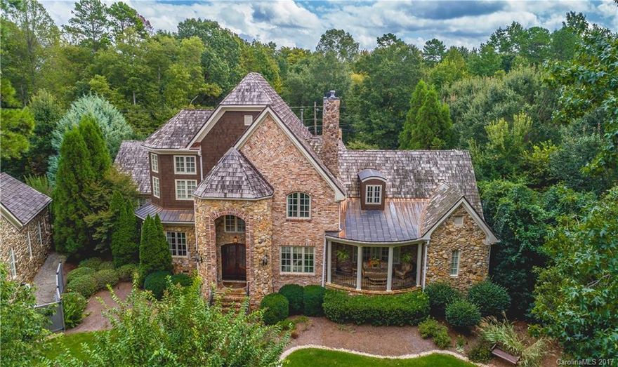 French country manor w/ perfect balance of luxury & casual comfort  in heart of South Park!  Dramatic entry hall w/ stone accent, heart of pine wood floors on main,gourmet kitchen w/ Viking, subZero & ASKO appliances, butlers pantry w/ wine cooler & ice maker,  4  fireplaces, owners suite on main w/ fireplace, sitting area, master bath with slate floors & steam shower,private outdoor living w/ covered porch, patio, fountain, beautiful flower garden & outdoor kitchen perfect for entertaining.