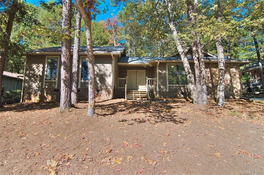 Ranch style living in Tega Cay! Newer HVAC, 2011. New roof. New driveway. New interior paint. New granite counters in kitchen. New carpet. White cabinets w black appliances. Wood burning fireplace in great room. Master bedroom w ceiling fan & walk in closet. Double sink vanity in master bath. Spacious secondary bedrooms. Large deck overlooks fenced backyard. Front & back yard newly mulched. Fort Mill schools. Tega Cay vacation lifestyle.