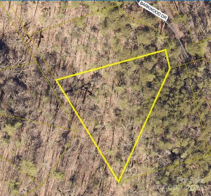 Build your dream mountain home or peaceful getaway on this private .83-acre lot located at the end of a quiet cul-de-sac in the gated Pine Mountain Lakes POA in Connelly Springs, NC. Surrounded by South Mountain State Park and NC Gamelands, this wooded parcel offers unmatched privacy and a true connection to nature with walking trails, streams, ponds, abundant wildlife, and scenic mountain views throughout the community.