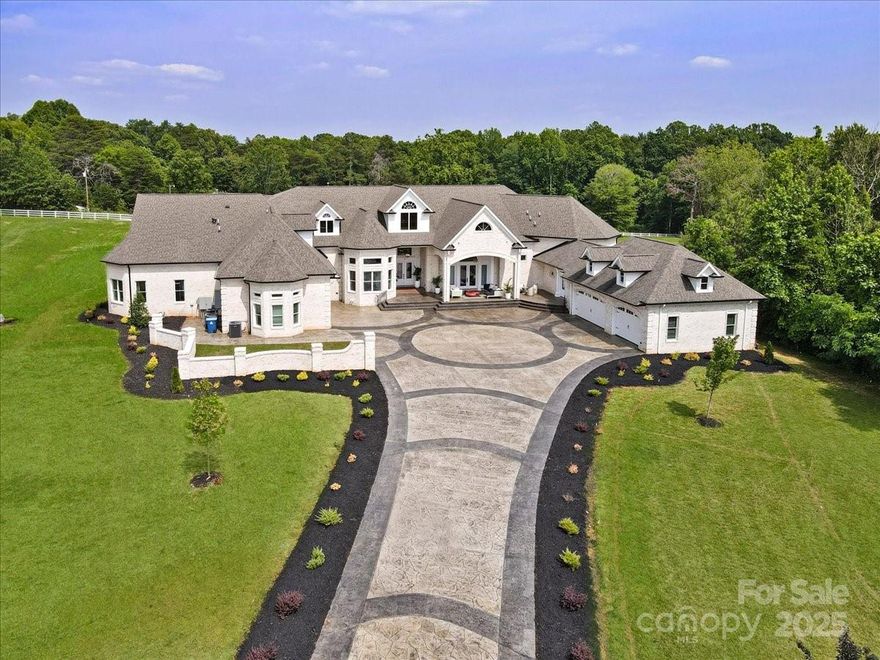 Welcome to a custom-built masterpiece offering luxury at every turn-privacy, elegance, and space to breathe. Included is an adjacent lot that’s perfect for a guest house, a pool house, or even a bard if you’re dreaming of a horse property. Properties like this rarely hit the market here. This space features soaring ceilings, impeccable finishes in every room, and is truly an entertainer’s dream. This space could be used as an event venue or a Bed and Breakfast so the options are limitless. Truly make the outdoor living space your dream come true-whether it’s a pool and hot tub, outdoor kitchen, tennis court/pickleball court, putting green, so many options. Do not miss this unique opportunity.