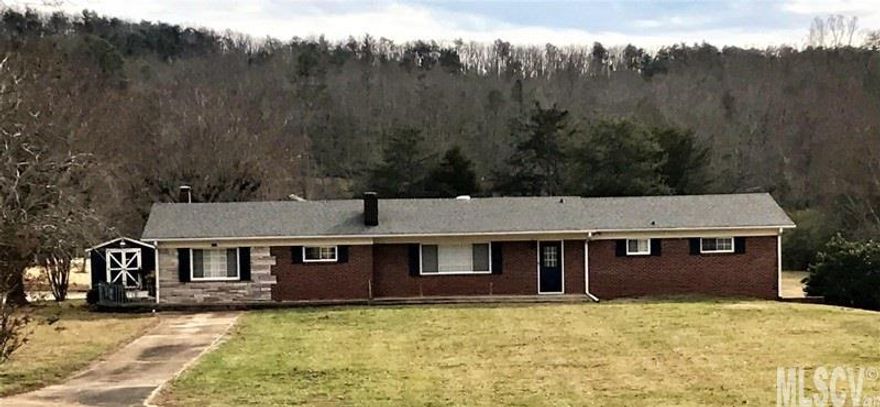 Executive Brick Ranch on 2.38 Acres! 4BR/2BA home with mostly hardwoods throughout. Spacious den, kitchen with ss appliances, bar & DR. Large LR with fireplace. Oversized bathrooms with linen closets. Full basement with partially finished bath, kitchen area, fireplace, single garage bay, older oil furnace that's no longer used. Back porch connected to double carport, utility bldg, double detached garage for storage. Per seller, windows replaced 2013, roof update 2013 & new HP installed 2014. The house sits further back on property & 225' of road frontage. Plenty of space for entertainment & great location to have chickens for farm fresh eggs!