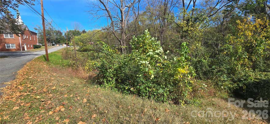 Buildable lot in downtown overlay district of Lenoir, NC. Zoned for single family, semi-detached, multifamily, and high density residential. City water and sewer available. 77 feet of road frontage. Includes the parcel directly behind this lot. Nearby to downtown Lenoir parks, shopping, restaurants and other businesses. `Setbacks are 10 feet from the side, 25 feet from the rear and 35 feet from the front.