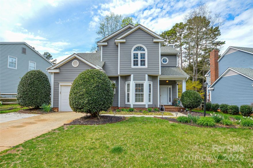 Nestled in the serene and sought after neighborhood of Cedarfield, this charming 3-bedroom, 2.5-bathroom home on a quarter acre lot offers the perfect blend of comfort and convenience. Relax in the family room by the fireplace at night or spend your days outside enjoying the fresh air in the oversized, vaulted screened in porch overlooking the fenced yard with mature trees. Enjoy Cedafield's amenities which include walking trails, playground and outdoor swimming pool. Cedarfield is located close to the Torrence Creek Greenway, shopping and dining.