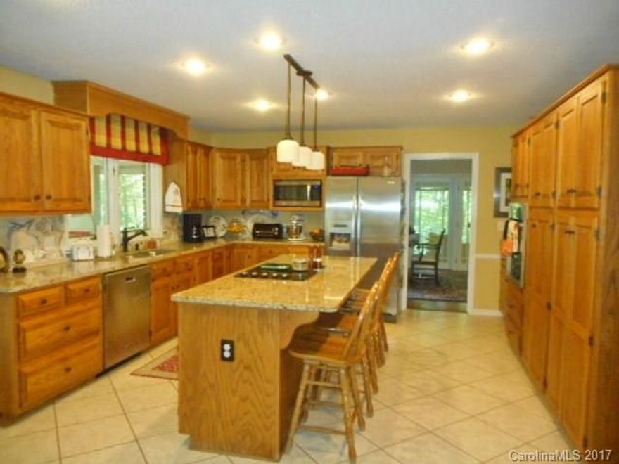 Wonderful Home located on a quiet Cul-de-sac. Formal Dining Room with Wooden Floors. Kitchen with an Island,
Cabinets galore, Plenty of Counter Space, Desk area, Granite Counter tops, Spacious Breakfast Area. Family Room with Vaulted Ceiling, Built ins and Wooden Floors. Sunroom has Fireplace with Gas logs, and Brick Flooring. Master Bedroom is Large with 2 Walkin Closets, Furniture Style Double Vanity, Master Tile Shower. Hall bath has Furniture Style Vanity and Whirlpool Tub.