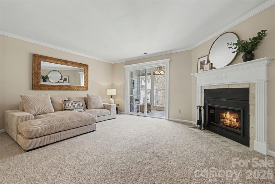 MOTIVATED SELLER - OFFERING $3,000 IN SELLER CONCESSIONS. Well-maintained brick-faced end unit in the heart of South Charlotte with a convenient ground-level entry. Fresh, inviting, and a price hard to find in this location.

Step inside to a welcoming foyer that opens to the main living area and spacious kitchen. The kitchen offers abundant countertop space plus flexible room for a breakfast table, coffee bar, or plant nook.

The spacious living room is bright and inviting with freshly painted walls and a cozy corner fireplace. A wall of glass sliding doors opens seamlessly to the sunroom, creating an airy, light-filled living space that feels both open and connected. The sunroom, highlighted by a skylight, is the perfect place for morning coffee, a good book, or entertaining while overlooking the peaceful garden setting.

Upstairs you’ll find two spacious primary bedroom suites, each with generous closet space and a private attached bath. The laundry closet located on the upper level for everyday ease. Don't miss the endless storage opportunities throughout! 

Conveniently nestled up to McMullen Creek Greenway, it's quick access to daily walking trails, biking, or dog walking. Dunhill Court is a charming, smaller community with its own private parking lot and plenty of guest spaces. Quick access to shopping, dining, hospitals, highways, and everyday conveniences makes this location hard to beat.