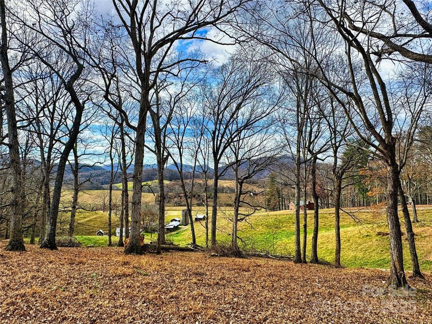 Large 2.4 acre parcel with sweeping westward-facing pastoral valley and farmland views.  No HOA restrictions allow flexibility for the future - one, two or three beautiful homesites or separate lots with Open Use zoning is only one dream to fulfill.  Old growth trees remain carefully limbed to allow filtered views westward for sunset and the glow of sunrise on the mountains beyond.    Easy access with State maintained roadway. Gentle slope makes this an easy build.  Site has been investigated for soils and multiple locations allow for the perfect home placement.