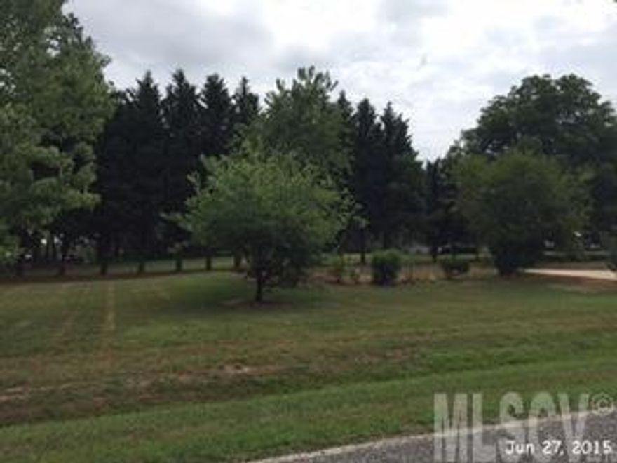 .58 acre building lot in Alexander County, tax value reflects when there was a manufactured home on the land that has been removed.  Located minutes from downtown, highway 64/90 and highway 16. This is a fannie mae property Purchase of the property will be cash at closing or terms acceptable to the seller