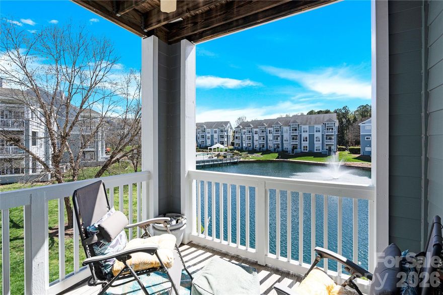 Wake up to beautiful water views in this inviting 2-bedroom, 2-bath condo designed for comfort and easy living.  Wonderful open floorplan with granite countertops in kitchen and tile backsplash.  Spend your mornings sipping coffee, gazing upon the picturesque view of the water on your covered patio.  The thoughtfully designed split-bedroom layout offers privacy, a spacious primary bathroom with oversized tile shower and double top vanity.  Community sits on the beautiful Lake Norman with its very own beach and offers all amenities including tennis, pool, fitness room, kayak and boat launch.  Refrigerator, washer and dryer are included.