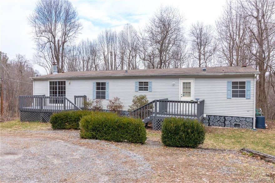 Must see...Vey well maintained 3 bedroom 2 bath home conveniently located between Black Mountain and Swannanoa. Walls have primer and waiting for fresh paint. Kitchen and laundry room have updated flooring. Wood burning fireplace, heat pump and an electric furnace for backup if needed to stay cozy warm in the winter. Nice back yard with lots of potential and winter views. Outbuilding for storage.