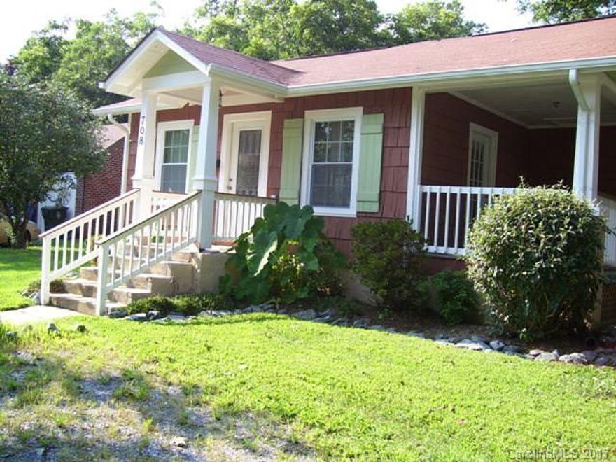 Ranch style with cedar shakes, level lot. Small deck, lovely side porch. Hardwood floors, must see.