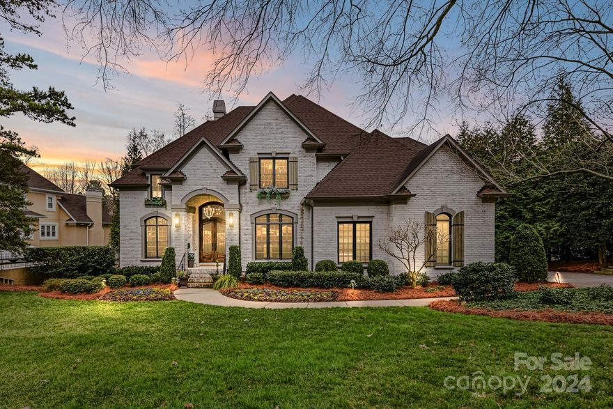 Sophisticated luxury & exquisite craftsmanship awaits at this white painted brick European-styled home. Striking presence & spectacular long-range views over #7 green -BCC golf course. Enter covered vestibule of iron/glass doors to an inviting open floor plan. Beamed ceilings, extensive millwork, hardwood floors & custom cabinetry! Dining Room w/wetbar, Office w/workstation & Great Room w/cast stone FP. Fabulous Chef’s kitchen w/walnut island, Wolf range, built-in refrig & wall of windows & door to terrace. Main Lvl Guest suite & laundry. 2nd  Lvl: Expansive primary- Spa bath w/dual vanities, soaking tub, heated floors & fashionista closet! 2 add'l bdrms w/ensuite baths & a bonus/bed! LL is an entertainers paradise:Gameroom w/bar & kitchenette, Media w/wall screen, 5th bdrm, bath & huge storage! Multi-levels of terrace/porch/patio to Pool w/natural stone waterfall, hot tub, grilling center & bar. This outstanding & updated residence offers personal relaxation & vibrant entertaining!