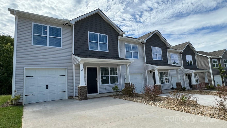 Welcome to ABERDEEN PLACE!! An urban community bustling with energy located in Asheville, NC and just a short trip to Downtown – with countless restaurants, entertainment venues, and art museums. These low maintenance town homes feature 1,375 sq feet of living space, including 3 bedrooms and 2.5 baths. The kitchen has beautiful countertops, tile backsplash, ss appliances and washer and dryer. With vinyl plank flooring and included blinds, this townhome is ready for you to move in and enjoy low maintenance living! The 1 car garage offers storage space and convenience. *Home features are subject to change without notice. Internet service not included. Sq footages are approximate*