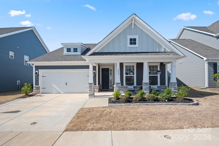 Welcome to this beautiful 1.5 story home in Massey. Built in 2023. Like NEW but w/ the added benefit of Owner installed updates; fenced yard, cobblestone paver patio, paver driveway extension & landscaping! You will love the inviting open concept plan w/ upgraded moldings & 5 1/4” baseboards. 9 ft ceilings & 8 ft doors help make this home feel spacious. Laminate wood flooring throughout all living areas & primary bedroom. The Kitchen has upgraded white cabinets w/ pull-out drawers for pots & pans, trash can & a pull-out spice rack. Enjoy the 30" gas cooktop & double oven. There are 3 BRs on the main including the spacious primary suite. The primary bath has an expansive double vanity & large walk in shower. Upstairs you will find a large Family Room / Flex Space. Don’t miss the unfinished attic storage areas. Relax on the screened porch while looking at the natural area behind the home. Community has an Olympic sized pool, lazy river and fitness center. You won’t want to miss this one.