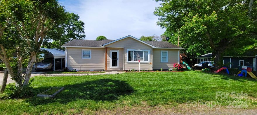 Perfect starter home in convenient location – Lots of elbow room in this 3BD/2BA 1,235 sq ft charmer!! Located approximately 14 min from Downtown Lenoir, and centrally located between Boone, Hickory, and Morganton. HIGHLIGHTS INCLUDE: Welcoming floor plan with lots of natural light, Large Living Room, Spacious Master Bedroom with master bath and walk-in closet, Well-Maintained Landscaping with Vibrant Lawn, Storage Building, Rear Deck, and a 2-car Carport over concrete. Refrigerator and electric range included! Take advantage of this wonderful Opportunity and schedule your showing today!!!