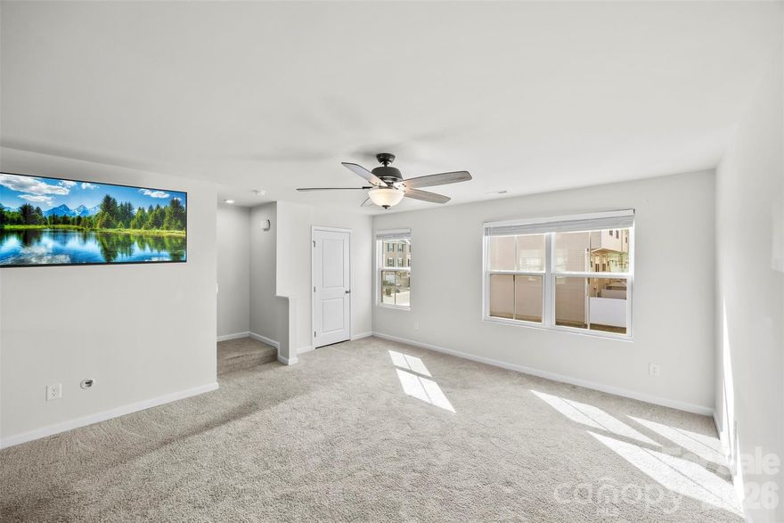 Welcome home to this beautifully maintained 3-bedroom, 2.5-bath townhouse in the desirable Glynwood Forest community of Fort Mill. Built in 2020, this move-in-ready home offers a smart, functional layout across three levels with modern finishes throughout. The upper level features an open-concept living area with a spacious living room, dining area, kitchen, and convenient half bath, perfect for everyday living and entertaining. Upstairs, you’ll find a private primary suite with a full bath, two additional bedrooms, a second full bath, and laundry conveniently located on the bedroom level. The main-level attached garage provides easy access and extra storage. Two large, mounted TVs convey with the home, offering added value and convenience for the next owner. Enjoy low-maintenance living with HOA-covered exterior care and community upkeep. Located in the highly sought-after Fort Mill School District with quick access to shopping, dining, and major commuter routes.


Schools listed reflect the 2025–2026 school year. Middle school zoning is anticipated to change for the 2026–2027 school year per district planning. Buyer to verify all school assignments.