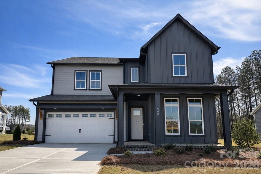 Large gatherings begin in Sugarbowl’s kitchen: a dramatic island, built-in wall oven and an intelligently placed walk-in pantry make entertaining and everyday cooking effortless. The dining and family areas open to a covered patio and a wall of rear windows fills the main space with daylight — a design that naturally showcases your finishes and makes hosting easy.
A private rear study offers a quiet, light-filled retreat, while the main level’s guest bedroom and full bath provide flexible living. The garage entry lands at a convenient backpack/drop zone and storage under the stairs keeps clutter at bay. Upstairs the Owner’s Retreat feels like a private suite with a sitting area, expansive walk-in closet and a spa-inspired Owner’s Bath featuring a roomy super shower; the central upstairs retreat, dedicated utility with counter and two additional bedrooms with private baths make the home ideal for both entertaining and everyday family life. Hardy Pond is a walkable neighborhood with easy access to grocery, local restaurants and nearby parks. Homes at Hardy Pond emphasize luxury, quality and service — featuring custom-look, high-end finishes, 10' ceilings, 2x6 exterior wall construction and energy-efficient systems.