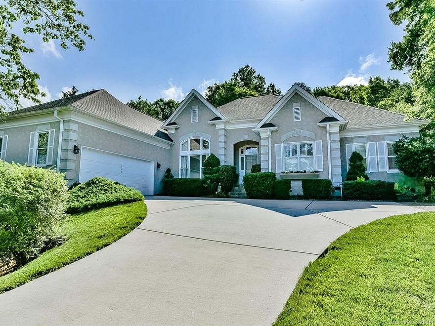 Lovely Simonini custom built ranch. Open & spacious feeling w/tall ceilings & lots of tall windows. Home features a picturesque private yard, patio with firepit & a great deck, Plantation shutters, Renovated Master bath, Updated kitchen, Rinnai tankless gas wtr htr,  great pantry & laundry w/sink. Pretty lakeside community, with beach area & marina. Boat slips available for lease $525-650/yr Super price-super convenient! Neighborhood hosts many social functions too!