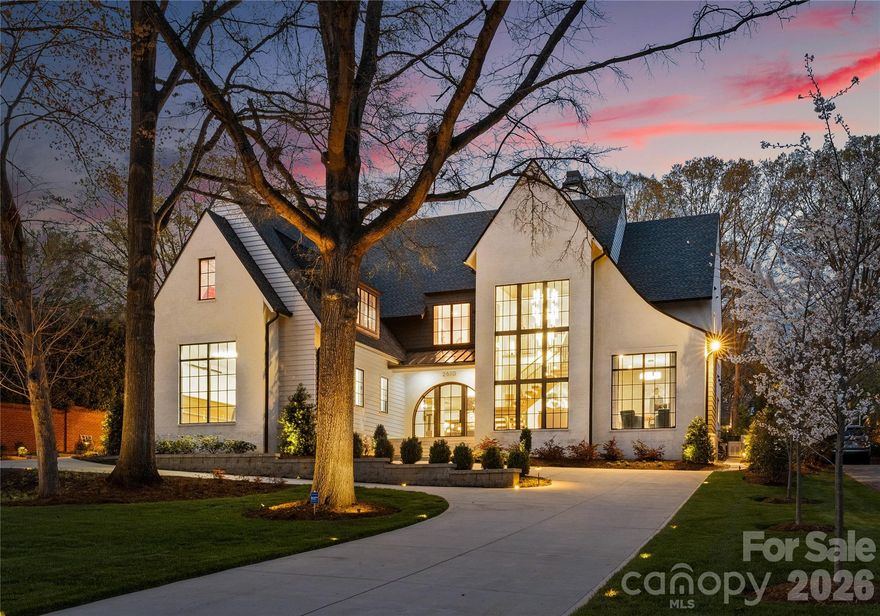 A masterclass in contemporary design and refined craftsmanship, this exceptional 2022 residence by Chiott Custom Homes offers approximately 7,000 square feet of thoughtfully curated living space. Clean architectural lines, a crisp white façade, and a visually striking roofline create a modern yet timeless presence. 

Inside, the home unfolds with an effortless flow, blending sophisticated finishes with a cool, livable aesthetic. Expansive interiors are designed for both elevated entertaining and everyday comfort, with an emphasis on natural light, scale, and seamless indoor-outdoor connection. At the heart of the home, the main living area is both striking and highly functional. A custom-designed kitchen serves as the centerpiece, featuring two expansive islands and a scullery. The adjoining dining area is enveloped by floor-to-near-ceiling windows, creating a light-filled setting that blurs the line between indoors and out. The refined yet inviting living room is enhanced by sleek floating shelves with integrated accent lighting and a 75” gas fireplace. 

The rear grounds are a true extension of the home’s design ethos: private, polished, and purposefully designed for gathering. A covered terrace anchors the outdoor living experience, offering a comfortable lounge area that transitions seamlessly onto an expansive paver patio with outdoor kitchen and firepit. Thoughtfully arranged dining and seating areas invite al fresco entertaining, while warm ambient lighting creates an inviting evening atmosphere. The always-pristine turf lawn is framed by mature landscaping and brick privacy walls, offering both beauty and seclusion. 

A fully integrated Savant home automation system delivers effortless control of your environment, creating a seamless, intuitive living experience tailored to your lifestyle. A whole-home Generac generator provides uninterrupted power and peace of mind. Every detail of this residence reflects a balance of contemporary sophistication and relaxed luxury—an exceptional offering for the discerning buyer seeking modern elegance in a highly livable form.