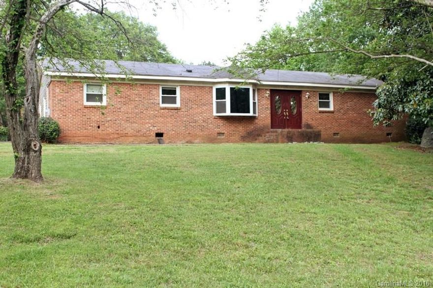 Beautiful brick ranch home with large flat wooded backyard with a huge storage! Home features wood burning fireplace in the living room and large covered porch for year around outdoor fun.