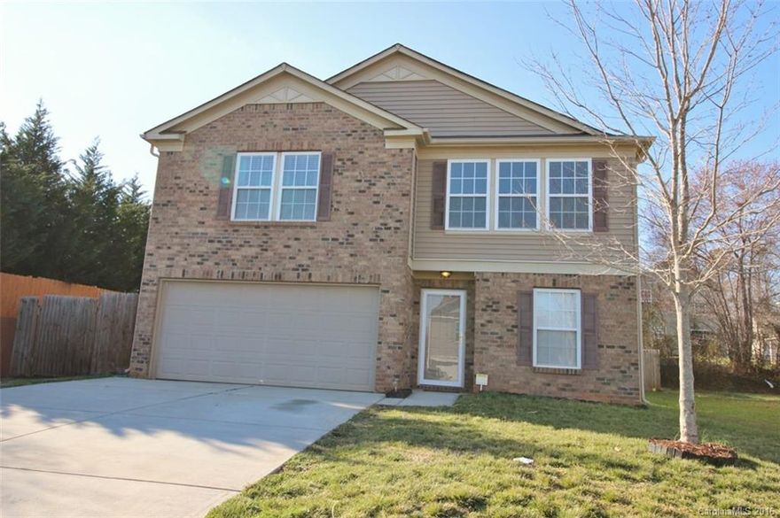 You'll love the large gracious living spaces inside and out! Laminate wood and tile floors lead you through this open plan with living, dining, great, kitchen and office on first floor and a huge master suite, 3 more bedrooms and a large loft on the second.  Outside entertaining is a must on the private back patio with fireplace and fenced yard.  Close to schools and only 35 min. to Charlotte!