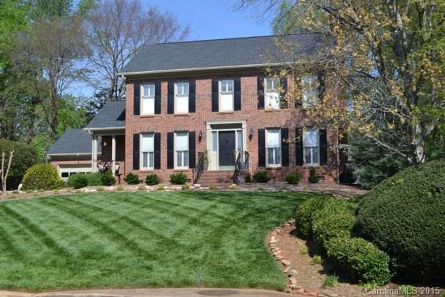 Prepare to be impressed!  This home has all new light fixtures, new stainless appliances, granite kitchen, updated baths and much more.  This home offers a formal dining room, large great room with fireplace/gas logs and build in bookshelves.  Outdoor living space is awesome!   Covered deck, patio and a waterscape, fenced back yard.  Newer roof and HVAC.  This one will not last long!