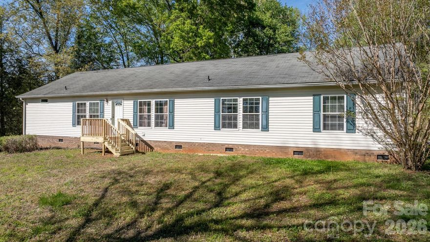 Spacious, affordable, and full of value—this Conover home checks all the boxes! Offering over 2,300 square feet, this well-maintained off-frame modular features 4 bedrooms and an inviting open floor plan perfect for everyday living and entertaining. The cozy fireplace adds warmth and charm to the main living area, while the generous layout provides plenty of room to spread out.

Situated on a large 0.8-acre lot within city limits, but nicely tucked away for privacy. This property is connected to city water and sewer—giving you added flexibility and peace of mind with no septic concerns. Enjoy a pleasant surrounding area with room to relax, garden, or expand your outdoor living space.

Location is key,-6 and this one delivers! Just minutes from I-40, making commutes to Taylorsville, Hickory, Statesville, and even Charlotte quick and convenient. If you’re looking for space, value, and a prime location, this property is a must-see!  First Look Open House 4/17/26  4-6 pm