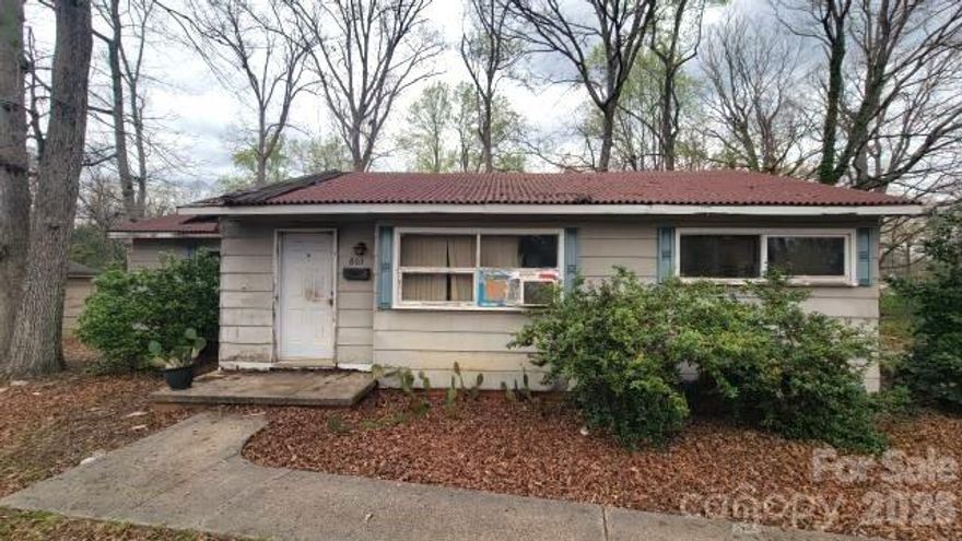 Investor Special! 3-bedroom, 2-bath ranch home situated on a generous 0.34-acre lot—loaded with potential and ready for your vision. This property offers a solid footprint with a functional layout, making it an ideal candidate for renovation or resale. The spacious lot and existing structure create a strong foundation to transform this property into something truly special. Enjoy the added value of a private setting with mature trees and outdoor space, plus a rear deck area that, with improvement, could become a great entertaining space. Conveniently located near shopping, dining, and major roadways, offering easy access to surrounding areas while still maintaining a quiet residential feel.
