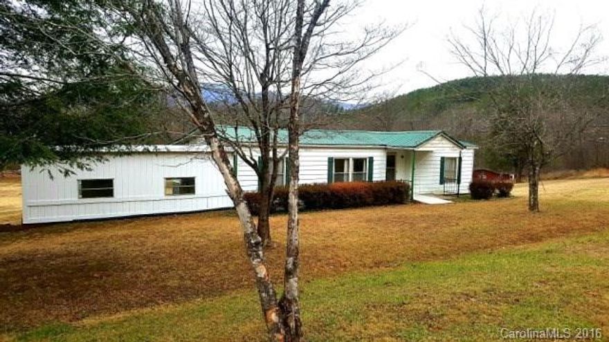Mini-farm located in Pleasant Gardens! Complete with fenced pasture, barn, creek, and pond. 3 bedroom 2 bath manufactured home with covered back porch, 2 car garage, carport and outbuildings.