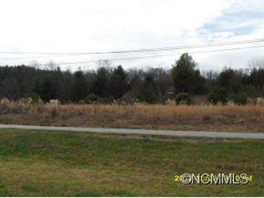 3 acre lot. Great location on busy high traffic area, just outside of High Vista. Excellent opportunity for your business.  Lot is partially cleared, partially wooded on mostly level lot.  Bank owned property. Buyer to have all inspections and to research property to their satisfaction.