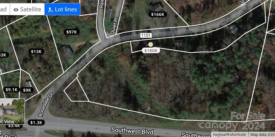 Mostly a wooded parcel of land in a very convenient location. Property fronts on Southwest Blvd and Rosedale Dr. Main portion has 4.77 acres and is NC PIN 2748727625. An additional tract is included and is NC PIN 274873211 and includes 0.13 acres for a total of approximately 4.9 acres. The property was previously used as farm land. It would be a great place to build a home or several homes. A high visibility property for commercial use, but would have to be rezoned. It is in the ETJ of Lenoir. Really nice piece of property. Owner is related to agent.