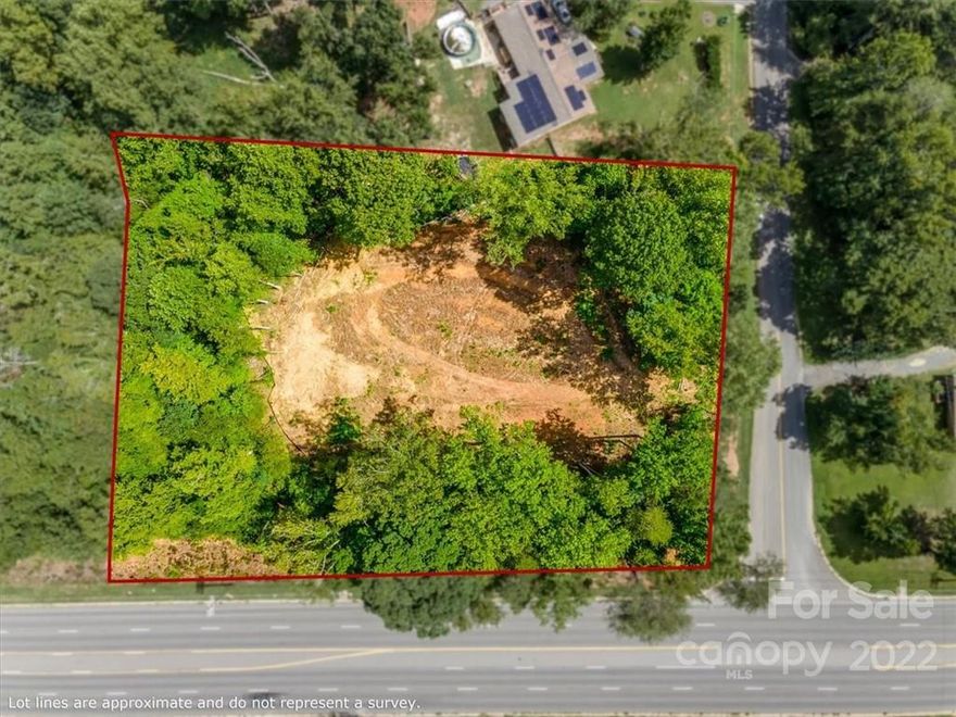 Corner commercial lot at Handsmill (Hwy 274) and Forestwinds Dr. Just minutes from Lake Wylie. Zoned BD1 so suitable for small retail/dining, medical/dental office, such as coffee shop, dental office, fitness center, insurance agency, etc.  Water available.  No septic system in place and sewer unavailable at this time.