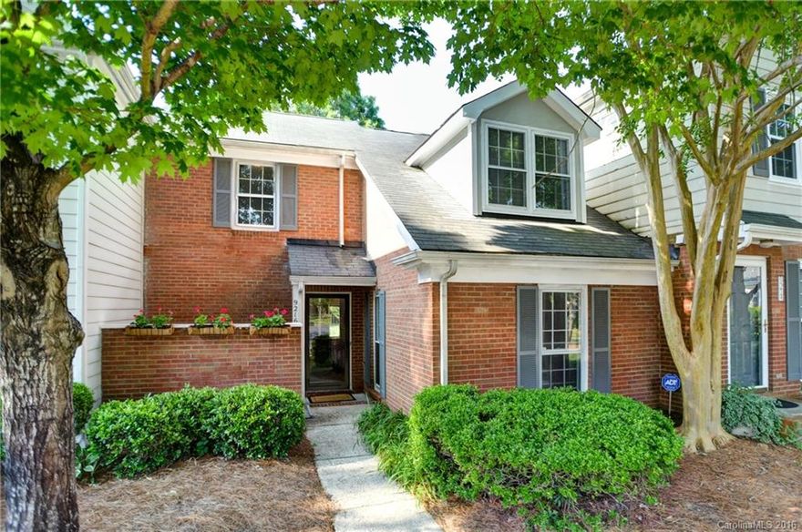 Wonderful open floor plan with soaring two story great room. Dual master bedrooms & bathrooms - one up and one down. Great Room has ceiling fan and brick fireplace with gorgeous mantle and opens to kitchen. Kitchen has island with bar stool seating and black appliances. Back patio overlooks park like setting. Completely move in ready with fresh paint and all new flooring throughout. Awesome South Charlotte location convenient to shopping, highways & restaurants.
