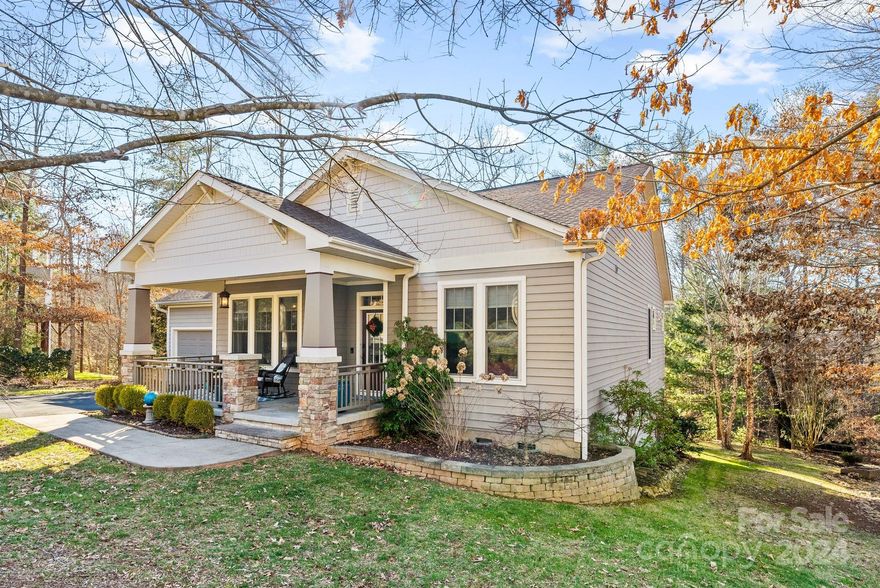 Enjoy the best of peaceful Biltmore Lake living in this stunning, spacious 4 bed/3 bath (mostly) one-level-living home. An inviting covered front porch overlooks quiet, tree-dappled street; step inside to admire a pristine main level with everything you need: 3 bedrooms (primary suite included), 2 full bathrooms; a family room; office ideal for WFH; living room; stunning gourmet kitchen with a large walk-in pantry; and a sunlit dining area that opens up to an expansive back porch, screened-in and covered for maximal comfort & ease, ideal for hosting friends or enjoying meals while looking out over a private, landscaped yard framed by mountain woods. Downstairs, the basement level offers more space still: an additional bedroom, bathroom, family room, wet bar, office, & covered stone patio. Ideally located a short walk or bike ride away from 62-acre lake with a swim beach, clubhouse, boathouse, and a myriad outdoor amenities & trails in sought-after mountain community Biltmore Lake.