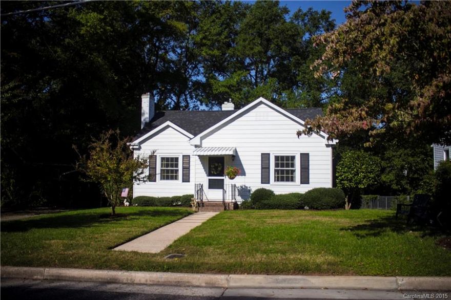 Cottage charmer!  This welcoming home is in a great location close to downtown! You will love the basement and garage space that are unexpected in this historic cottage.  The home has been very well maintained.  Hardwood floors have been protected with carpet all these years.  Great room with fireplace is open to the dining room.  Larger bath has new flooring.  Backyard is very private. Good storage space in the floored attic is a bonus!