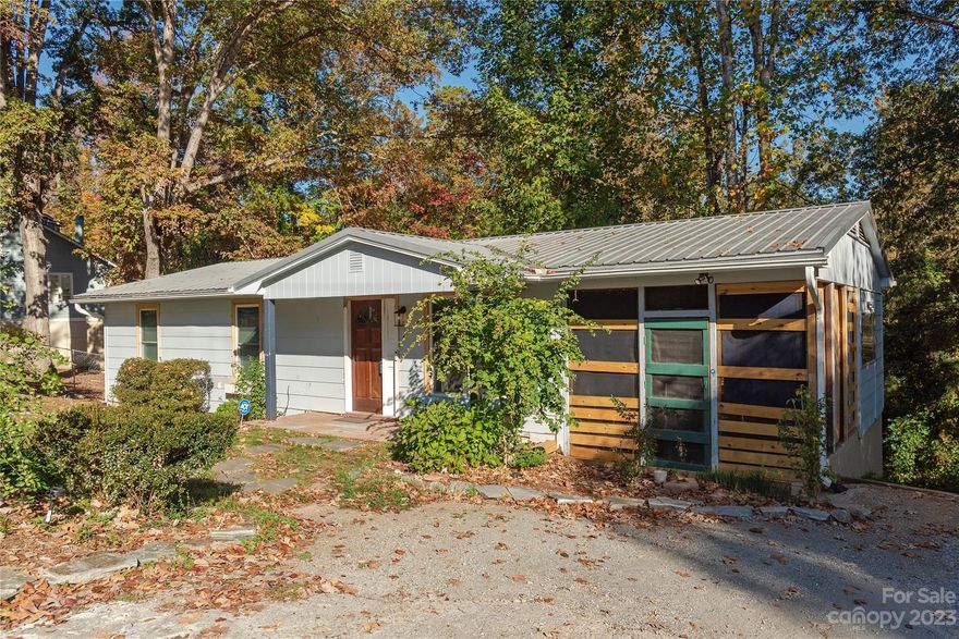 In-town home on a quiet street within walking distance of downtown Tryon. One level living with three bedrooms, kitchen, dining, and living room on the main floor. Laundry room access through the side porch. Improvements to the house include twelve new insulated windows, new kitchen appliances, new lower kitchen cabinets, a new washer/dryer, upgraded gutter drainage piping, and a dozen new trees planted in the yard. Unfortunately, the seller ran out of funds to complete the renovation of this home, so it awaits the next owner to make the final aesthetic improvements. Make this your primary residence, or put it into your rental portfolio. Everything in and on the property when you see it is included in the sale.