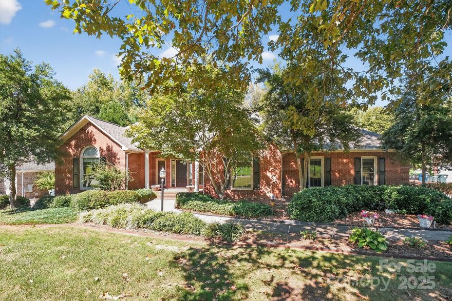 Back on the market due to no fault of the Sellers!  Buyer’s Agent Welcome! This beautifully maintained 4–5 bedroom, 3-bath home offers the perfect blend of indoor comfort and resort-style outdoor living. The backyard is a true oasis, designed for staycations and entertaining. Enjoy an in-ground pool, oversized hot tub, cozy fire pit, custom arbor, covered patio, and ambient lighting that creates a magical atmosphere for evening gatherings or quiet relaxation.
Inside, the main level features an updated kitchen with custom pull-out cabinetry, tile backsplash, under- and over-cabinet lighting, and designer finishes throughout. The open-concept layout includes a split-bedroom floor plan, a spacious living room with vaulted ceilings and a gas log fireplace, and a formal dining room that easily doubles as a home office. Step out onto the Trex deck with its own arbor and take in serene views of your private backyard retreat.The finished basement offers incredible versatility with a massive entertainment area, an additional bedroom, full bath, bonus room (ideal as a 5th bedroom or home gym), plus generous storage space. A stand-up crawl space with built-in workbench provides convenient storage for tools and yard equipment.
Don't miss this exceptional home—schedule your private showing today!