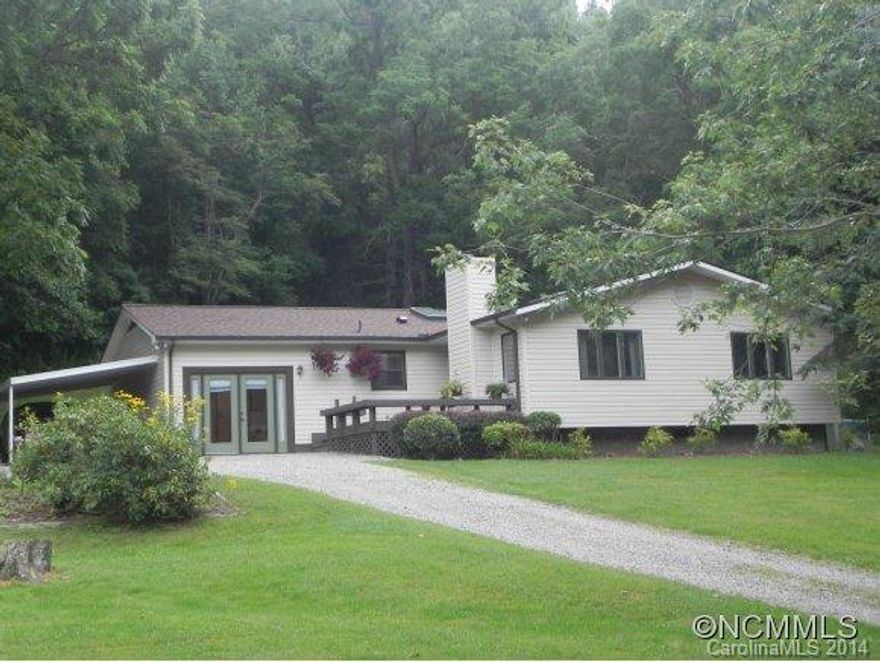 Surrounded by parkway 15 min. to downtown 3 bed 2 bath with big bonus room on private/lush 1.13 acres. Updated kitchen(corian counters, pull out trash/recycling cabinet, cutting board drawer, glide shelves). Custom trim, new roof&skylights (May),HVAC (2009). Plenty of space to play and relax(fire pit, level play areas, swing set, garden space,shade trees). 2 buildings (storage/ workshop)It's a must see and feel property! (Owner is list agent)