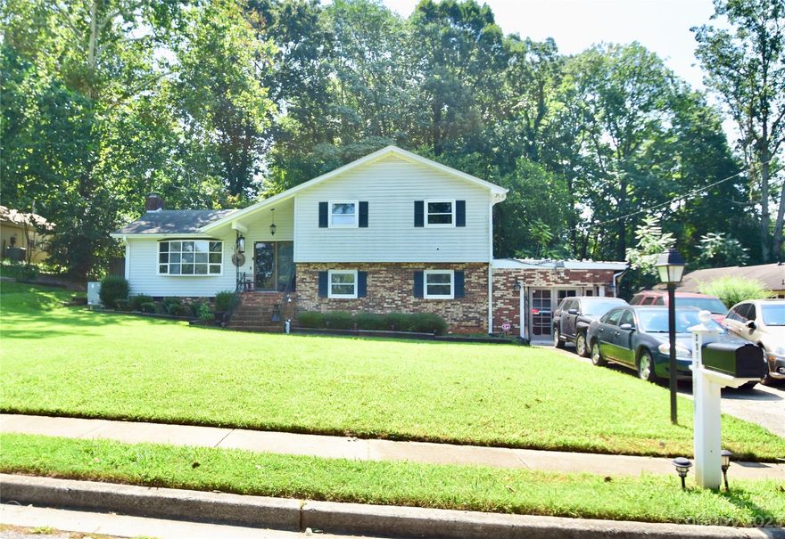 Come see this large tri-level home in the highly sought after community of Pinehaven. This home has 3 bedrooms, 3 bathrooms, and a bonus flex room currently used as a fourth bedroom. The garage has been converted into an entertainment space equipped with its own mini-split system. There is a large, covered,  screened-in back porch off the living room. The backyard is fully fenced with a gate entry door on either side of the house. The home does need some interior cosmetic updates and a new roof but the price offering reflects the material condition. So if you are searching for more house for your money in a great location with easy access to Charlotte then be sure not to miss out on this one. Make your appointment today to see the opportunity that awaits.