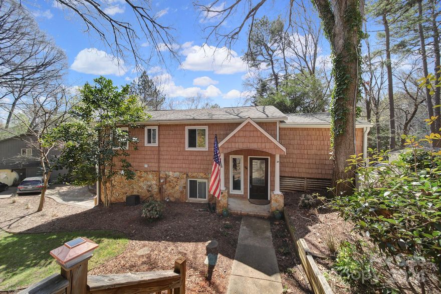 ***Buyer Rate Buy Down Opportunity!! Seller offering Incredible chance for Buyers to obtain 2/1 buydown on interest rate w/acceptable offer!***** Welcome Home to Lake Life! Beautiful lakefront property includes private dock that can accommodate a lift. Outside is an entertainers dream w/natural gas BBQ, outdoor sink plumbing, retractable awning, large Trex built deck perfect for gatherings. Time to relax "inside" find your cozy spot on the screened porch w/fireplace, proj TV, & custom weather resistant window coverings. Inside has large dining room, built-in bar, open living room, huge island, & custom kitchen w/too many upgrades to list! Upstairs of tri-level features 1 of 2 Primary suite's w/ attached sitting rooms, 3 add'tl large bdrms. Low level has 2-room owners' suite w/custom walk-in closet & direct access to the lake, & conveniently located laundry room. Classic Tega Cay lot w/ 2-driveways, garage, workshop, storage shed, plenty of parking space!