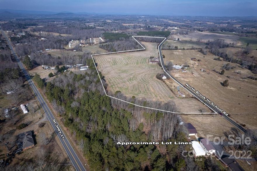 Located just off Hwy 27 West on North Brook #3 School Road, this 22+/- acres has so many possiblilites. Whether you are looking to build your new dream home, have a small farm, would like to divide and develop the property for single family dwellings or multi-family homes or even commercial property, this land can be yours. This land has over 2000 feet of road frontage and could easily be divided in multiple parcels for building. This property has a trailer, old home, duplex and barn/building that has been given no value due to condition. This property has two wells and two septic systems (no records on file.) Neither the seller or agent gives any representation to the condition of the wells and septics. Potential buyers should do your due diligence with inspections.