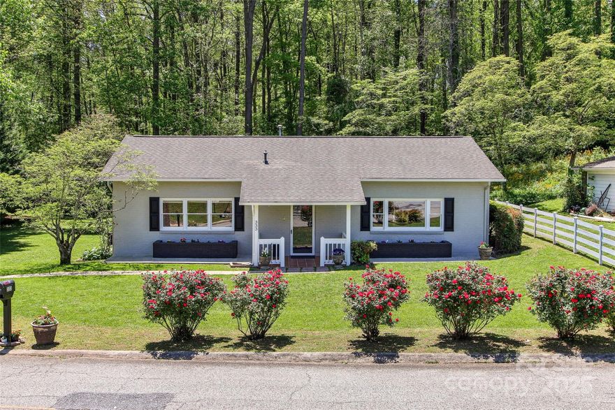 Charming and well-kept brick home in Brevard!  Approximately one mile to the heart of downtown, this one-level home offers easy living on an open and level lot with beautiful landscaping, separate storage shed and rocking-chair back porch.  You'll enjoy three nicely sized bedrooms, one full bath and a large living-dining area with lots of natural light.  The kitchen features an open layout and new appliances.  New HVAC, paint and more.  This beautiful home offers an optimal location on a beautiful lot with easy-access to all Brevard, NC has to offer.