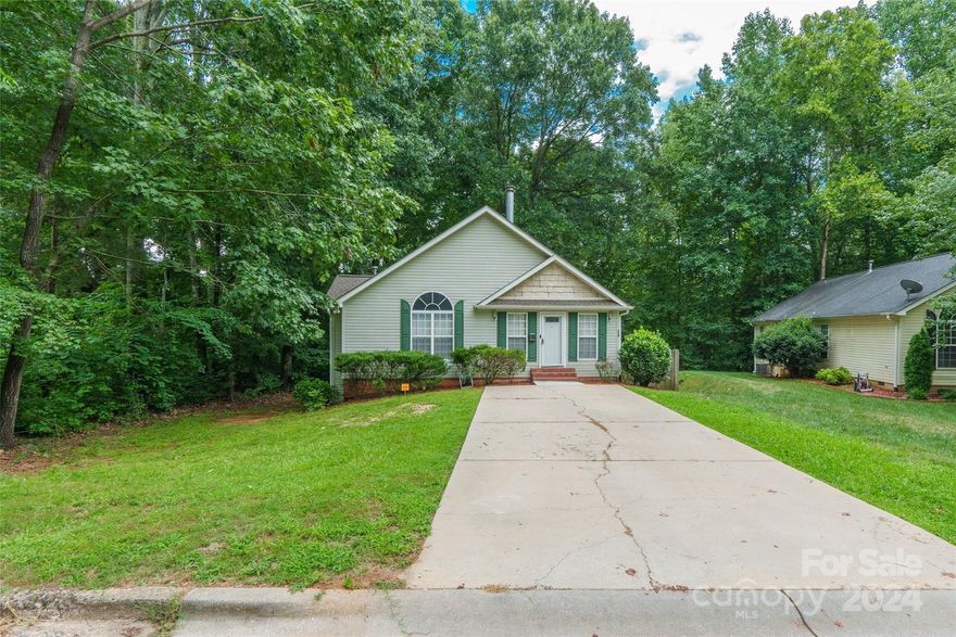 Step inside this meticulously maintained 3 bedroom 2 bathroom ranch - right in the heart of Fort Mill! Located within walking distance to charming Downtown Fort Mill and Walter Elisha Park, you'll also be conveniently close to I-77 and local shopping & dining. Great for a first time homebuyer or someone looking to downsize! Tucked at the back of a quiet street with no HOA, you'll enjoy lazy afternoons spent on the large back deck. Enjoy additional space for entertaining in the finished basement, which includes 500SF of unfinished storage and prewiring for an entertainment system. This home has hardwood floors throughout and custom curtains on all windows that will convey with the house. Upgrades made to increase energy efficiency and security, including a home central system (subscription needed) and a smart doorbell. Pride of ownership shines! Rare opportunity zoned for desirable Fort Mill schools and ready to be made yours!