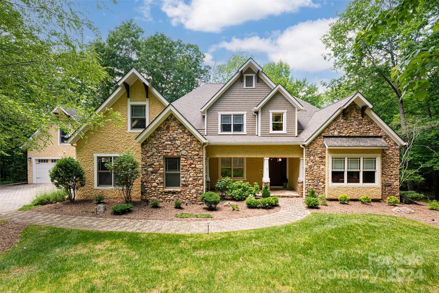 Located in Scott's Ridge, a gated section of Biltmore Lake & protected by a permanent Conservation Preserve of 138 acres, 741 Wickhams Fancy is situated on 2.11 acres offering privacy yet so close to all amenities.  This grand, custom built 5 bed, 5 1/2 bath home offers exquisite details that include Bosch & KitchenAid appliances, Quartersawn kitchen cabinetry, elevator,  3 gas fireplaces, primary suite on main w/ opulent walk in shower & separate steam room, radiant heat floors in all full bathrooms, 3 car garage.  The expansive deck, screened porch with fireplace and fenced yard surrounded by trees next to the community trail, make entertaining guests & family a joy.  Biltmore Lake has over 7 miles of community trails, pickleball & tennis courts, playground and 62 acre lake with a community boat house.  Just 10 miles to downtown Asheville, minutes to Arboretum, breweries, shops and Blue Ridge Parkway.  House can come furnished. Come experience all Biltmore Lake has to offer!