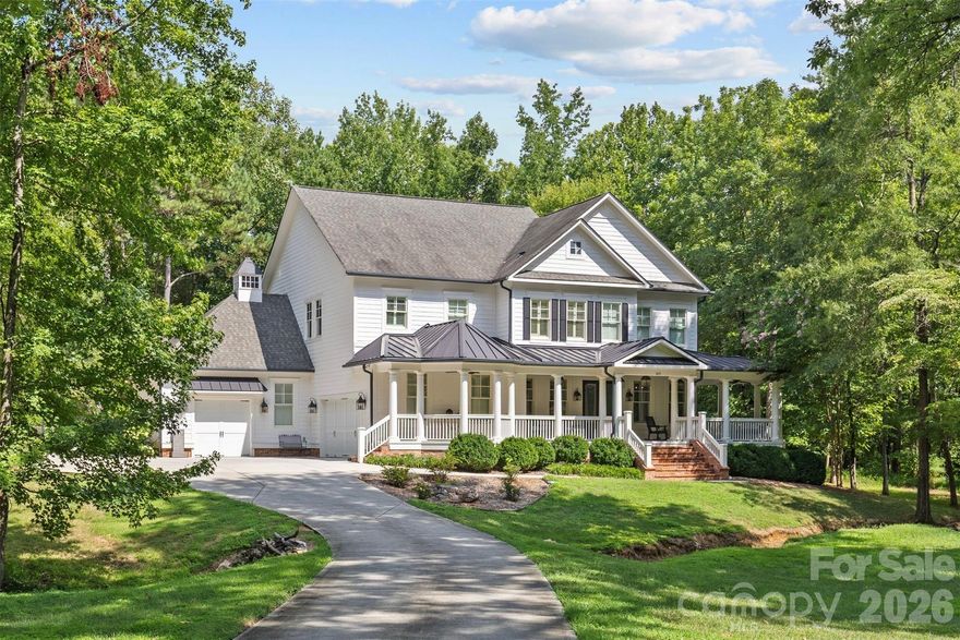 Experience luxury, privacy, and timeless design in this exceptional estate, nestled within the intimate, gated equestrian enclave of Oak Grove Farm. Perfectly positioned on a breathtaking 3-acre private lot, this residence offers a rare blend of seclusion, security, and resort-style living—wrapped in classic Southern charm and surrounded by natural beauty.
Start each day on the expansive wraparound porch, where quiet mornings and golden-hour evenings unfold against a backdrop of tree-lined grounds. Beyond, the outdoor oasis features a custom-designed saltwater pool & spa, elegant limestone decking, and ambient lighting that transforms the space into a stunning nighttime retreat.
At the heart of the home, the chef’s kitchen seamlessly blends form and function with Thermador appliances, double ovens, a gas cooktop, built-in refrigerator, microwave drawer, Shaws porcelain farmhouse sink, pot filler, and bespoke custom cabinetry. A striking butcher block island anchors the space, flowing effortlessly into the light-filled great room—designed for elevated everyday living and effortless entertaining.
Thoughtfully designed living continues with a cozy day porch with fireplace, a stone patio with a second fireplace, and a fire pit tucked among the trees—creating multiple destinations to gather, relax, and entertain.
The primary suite serves as a private sanctuary, complete with a tranquil sitting area, spa-inspired bath, and expansive walk-in closet—delivering a true retreat experience. Generously sized secondary bedrooms each feature private ensuite baths, offering comfort and privacy for family and guests alike. A third-floor expansion opportunity provides the flexibility to create additional living space—whether a home theater, fitness studio, or private guest retreat—tailored to your lifestyle within this one-of-a-kind estate.