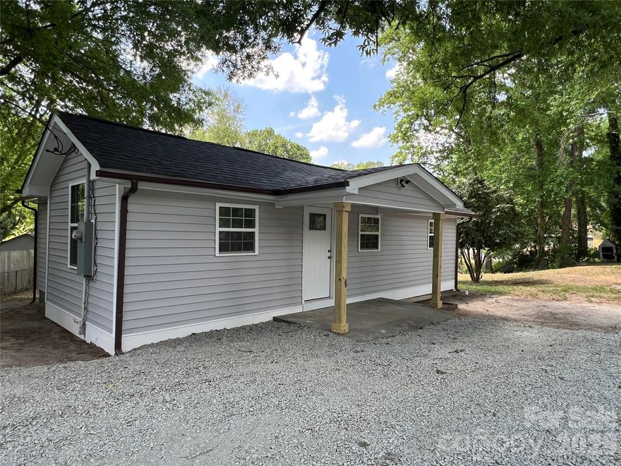 Completely renovated 2 Bed/1 Bath home. This cozy cottage boasts new vinyl siding, new paint, new flooring, new double pane insulated windows, new light fixtures, new HVAC, new deck/railings on back porch. Roof is only 4 years old, and the electric Water Heater is only 2 years old. The mature trees in the front offer shade over the yard, and the backyard has two young peach trees that are already bearing fruit. There are two sheds in the back yard, one is a little worse for wear and the owner will offer to take it down if the buyer does not want it. Whether you're just starting out or in the process of downsizing, this is the perfect place for anyone needing a smaller home relatively close to downtown.