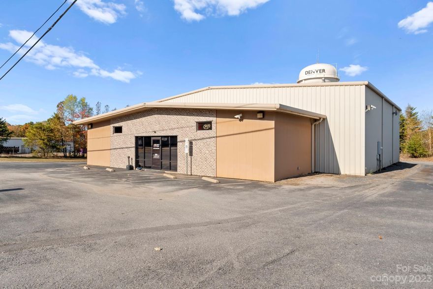 Situated NC-16 Business Hwy in Denver, NC, this 6,061 SF building offers 2,138 SF of showroom/office space, 3,923 SF of warehouse, 1,321 SF of additional mezzanine space, and 2 drive-in doors. Zoned B-N - Neighborhood Business. Paved Parking. Maximize your brand exposure with excellent visibility form the highly traveled road and easy access to Hwy 150 and Hwy 73.